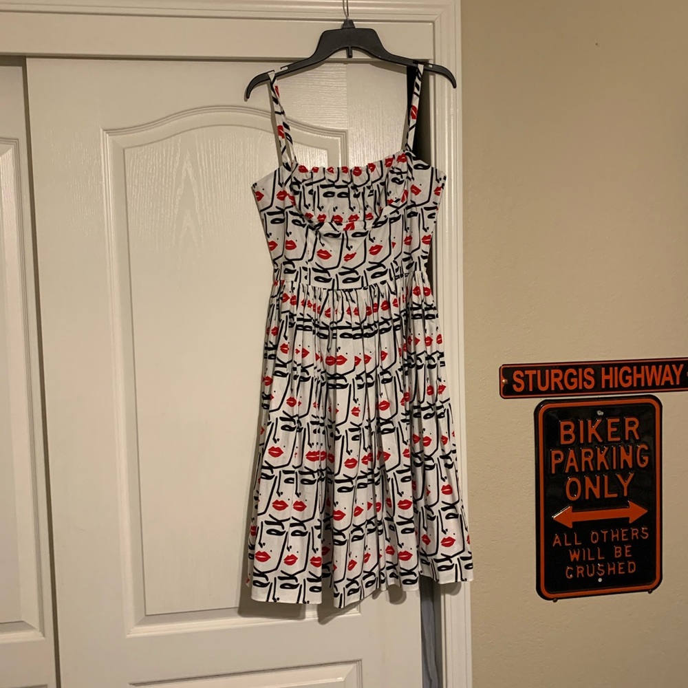 Bernie Dexter wink and beauty mark Paris dress